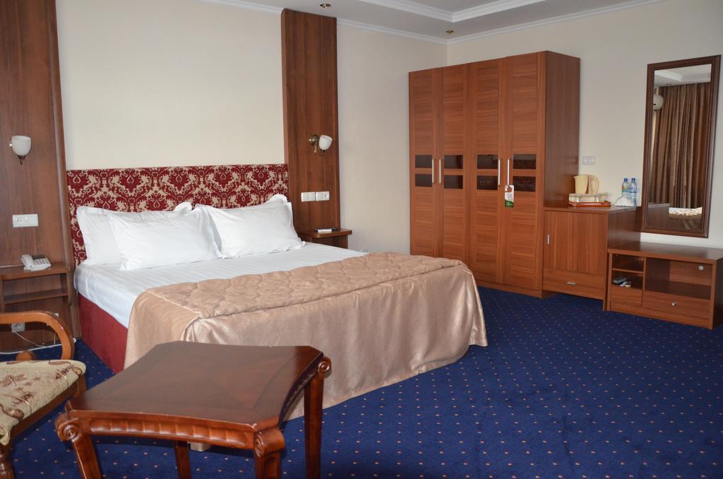 Dostyk Hotel Simkent Buitenkant foto
